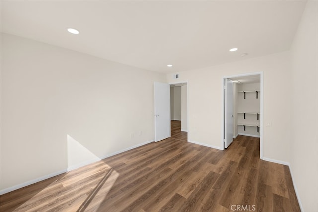 13115 Le Parc, Chino Hills, CA 91709 - unfurnished bedroom with wood finished floors, baseboards, recessed lighting, a spacious closet, and a closet