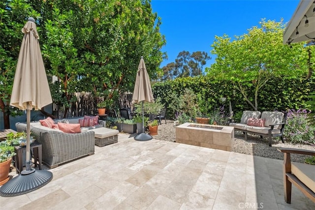 19172 Sierra Maria Rd, Irvine, CA 92603 - view of patio with an outdoor living space with a fire pit