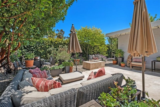 19172 Sierra Maria Rd, Irvine, CA 92603 - view of patio / terrace featuring an outdoor living space with a fire pit