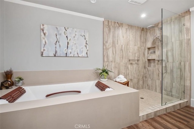 19172 Sierra Maria Rd, Irvine, CA 92603 - full bathroom with a walk in shower, a garden tub, recessed lighting, and wood finished floors
