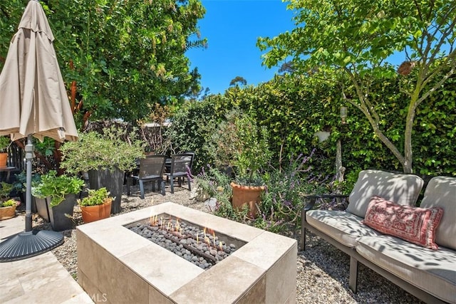 19172 Sierra Maria Rd, Irvine, CA 92603 - view of patio with an outdoor fire pit