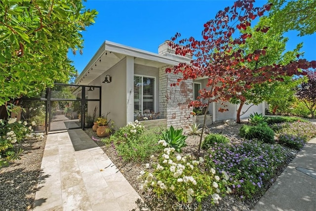 19172 Sierra Maria Rd, Irvine, CA 92603 - view of front of property with stucco siding and a gate