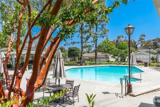 19172 Sierra Maria Rd, Irvine, CA 92603 - community pool featuring a patio