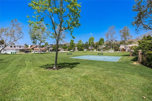 19172 Sierra Maria Rd, Irvine, CA 92603 - view of basketball court with community basketball court, a yard, and a residential view