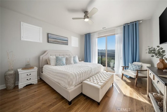 997 Canyon Ln, Pismo Beach, CA 93449 - bedroom with access to exterior, wood finished floors, and ceiling fan