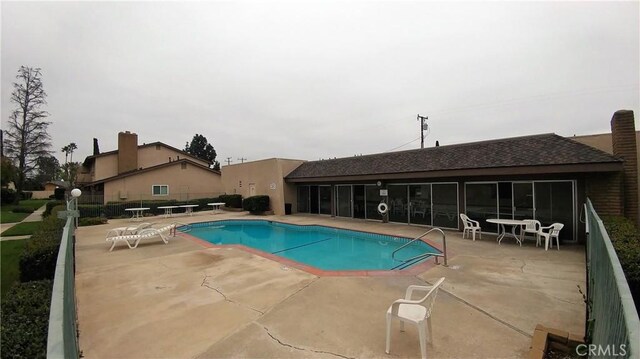 12700 Newport Ave Unit 36, Tustin, CA 92780 - community pool featuring a patio area