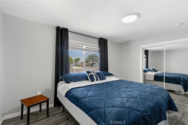 28799 Murrieta Rd, Menifee, CA 92586 - bedroom featuring wood finished floors, a closet, and baseboards