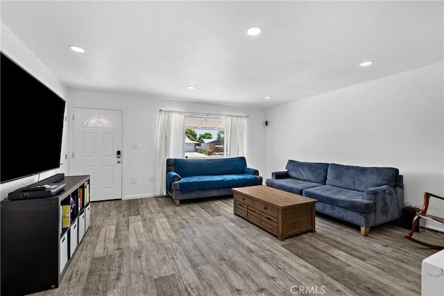 28799 Murrieta Rd, Menifee, CA 92586 - living area with wood finished floors, recessed lighting, and baseboards