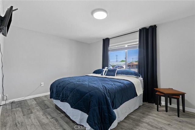 28799 Murrieta Rd, Menifee, CA 92586 - bedroom featuring baseboards and wood finished floors
