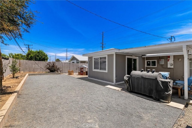 28799 Murrieta Rd, Menifee, CA 92586 - rear view of house with a fenced backyard, a patio area, and outdoor lounge area