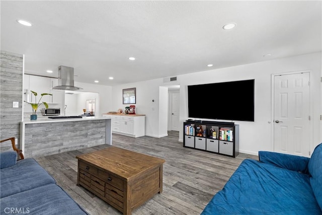 28799 Murrieta Rd, Menifee, CA 92586 - living room featuring wood finished floors, recessed lighting, and baseboards