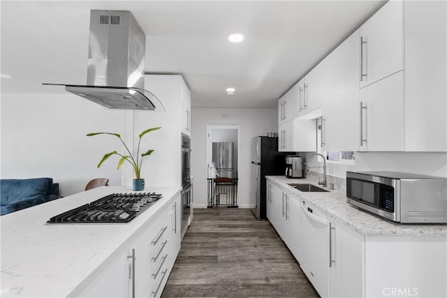 28799 Murrieta Rd, Menifee, CA 92586 - kitchen with stainless steel appliances, ventilation hood, a sink, dark wood finished floors, and white cabinetry