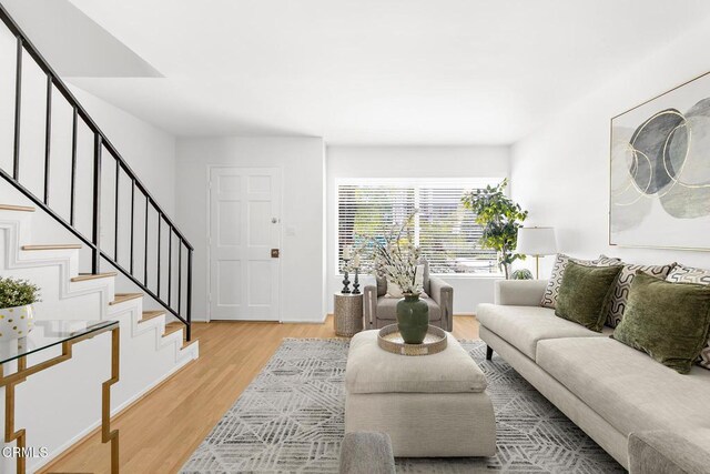 10801 Blix St Unit 2, Toluca Lake, CA 91602 - living area featuring stairs and light wood finished floors