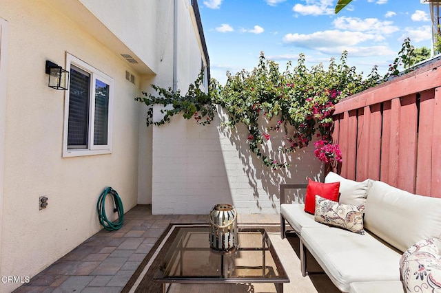 10801 Blix St Unit 2, Toluca Lake, CA 91602 - view of patio featuring an outdoor living space