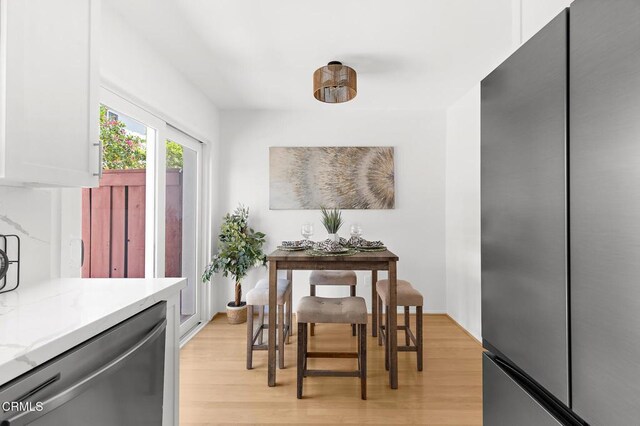 10801 Blix St Unit 2, Toluca Lake, CA 91602 - dining space featuring light wood-style floors