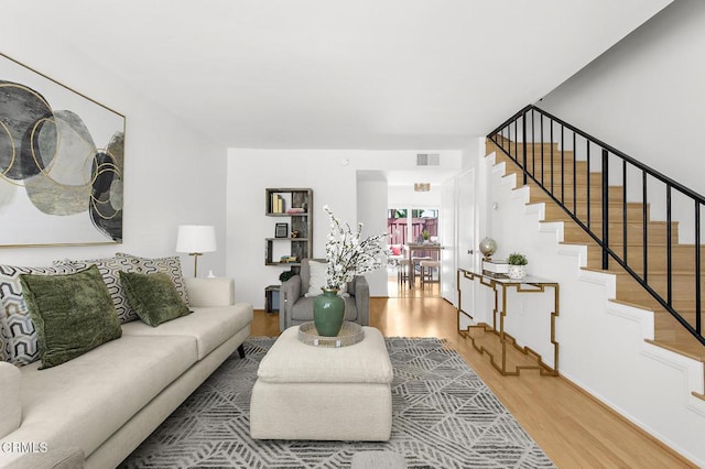 10801 Blix St Unit 2, Toluca Lake, CA 91602 - living area with wood finished floors and stairway