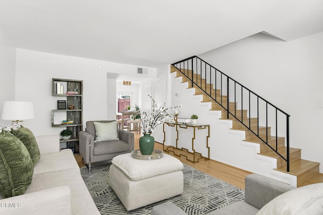 10801 Blix St Unit 2, Toluca Lake, CA 91602 - living room featuring stairway and wood finished floors