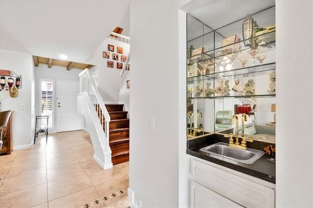 26 Pueblo Vista Dr, Palm Springs, CA 92264 - indoor wet bar featuring stairs, light tile patterned floors, and baseboards