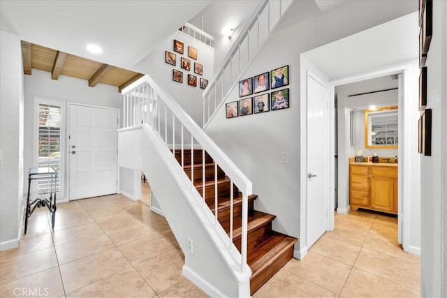 26 Pueblo Vista Dr, Palm Springs, CA 92264 - stairs featuring tile patterned flooring, beam ceiling, and baseboards