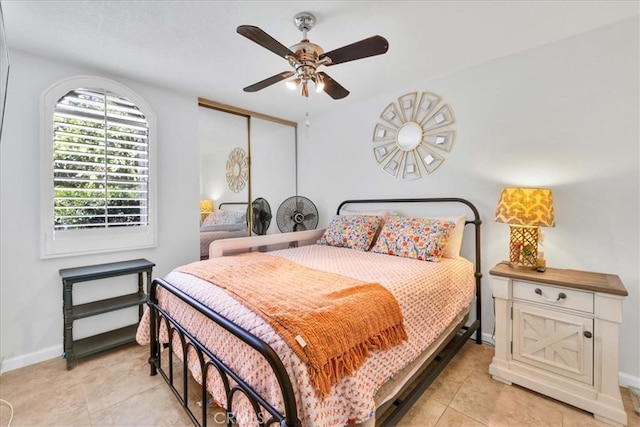 26 Pueblo Vista Dr, Palm Springs, CA 92264 - bedroom featuring light tile patterned floors, baseboards, a closet, and a ceiling fan