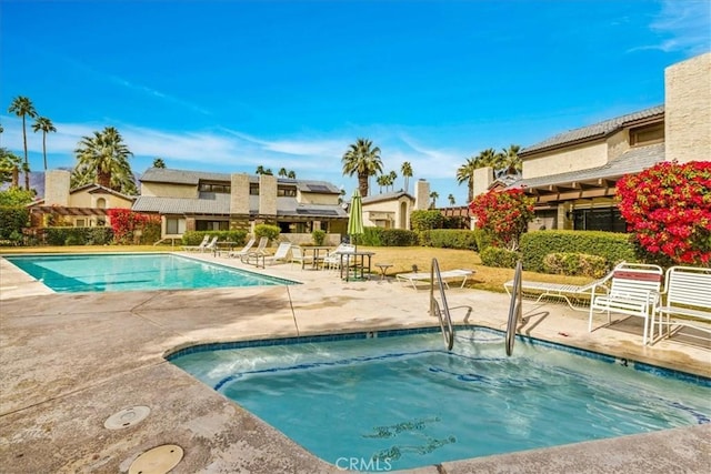 26 Pueblo Vista Dr, Palm Springs, CA 92264 - community pool featuring a patio area