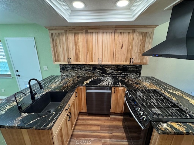 4787 Boardwalk Dr, Riverside, CA 92503 - kitchen featuring wall chimney exhaust hood, stainless steel dishwasher, black gas range oven, a peninsula, and a tray ceiling