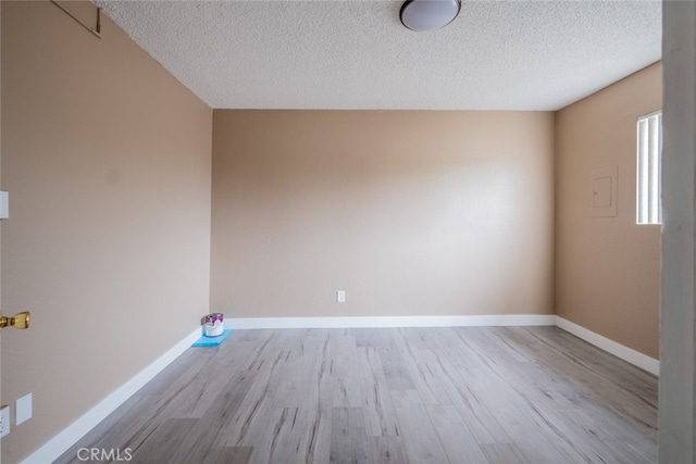 1341 N Keystone St, Burbank, CA 91506 - empty room with wood finished floors and a textured ceiling