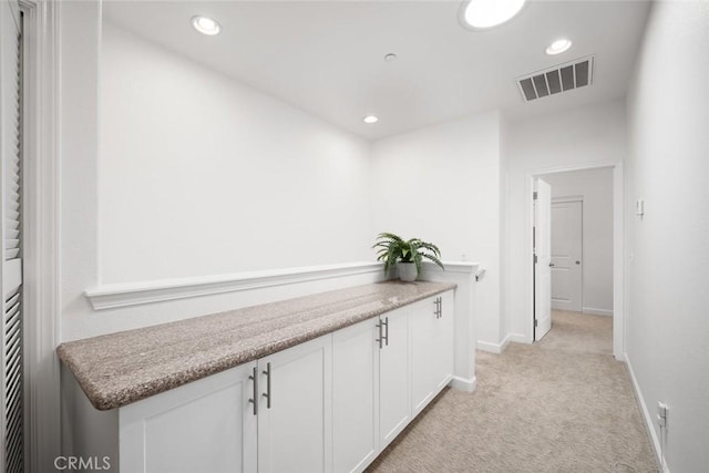 949 Humbert Ave, San Luis Obispo, CA 93401 - corridor featuring light colored carpet, baseboards, and recessed lighting