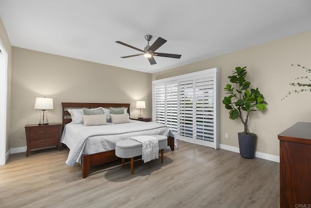 17636 Plaza Arica, San Diego, CA 92128 - bedroom with wood finished floors, baseboards, and a ceiling fan