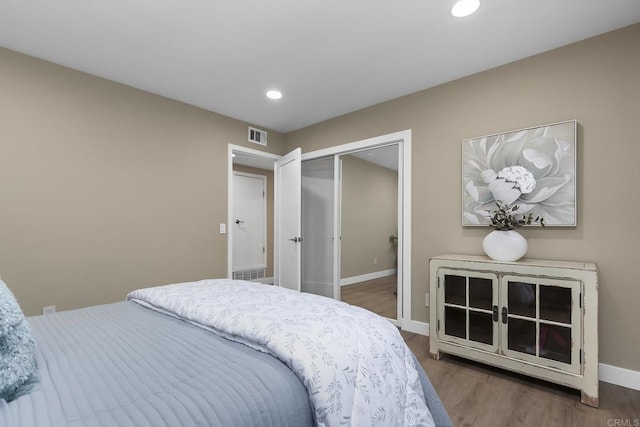 17636 Plaza Arica, San Diego, CA 92128 - bedroom with wood finished floors, recessed lighting, baseboards, and a closet