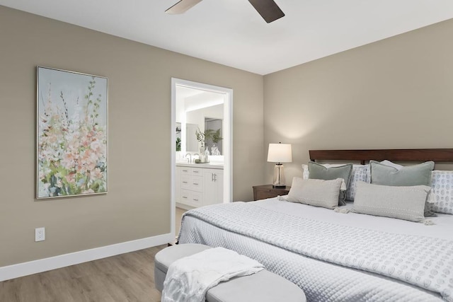 17636 Plaza Arica, San Diego, CA 92128 - bedroom with wood finished floors, baseboards, ensuite bathroom, and ceiling fan