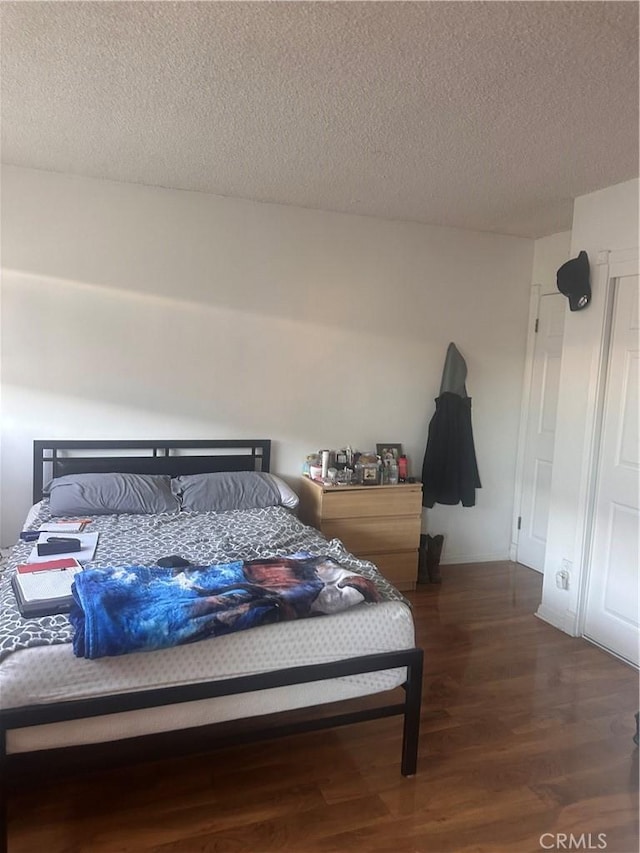 6339 Morse Ave Unit 202, North Hollywood, CA 91606 - bedroom with wood finished floors and a textured ceiling