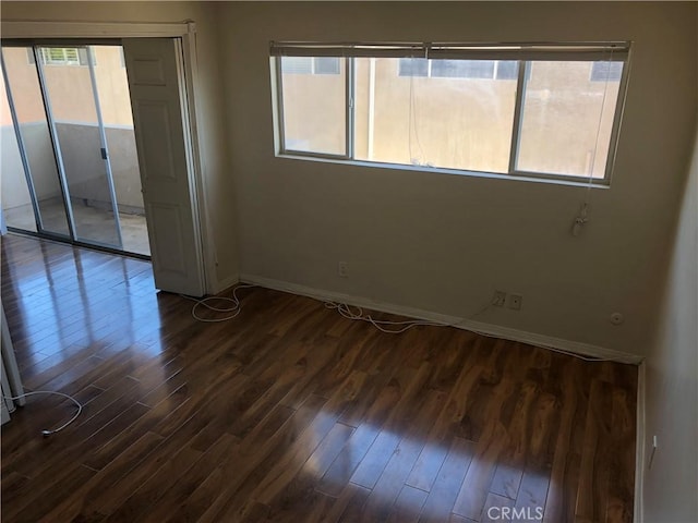 6339 Morse Ave Unit 202, North Hollywood, CA 91606 - empty room with baseboards and dark wood-style flooring