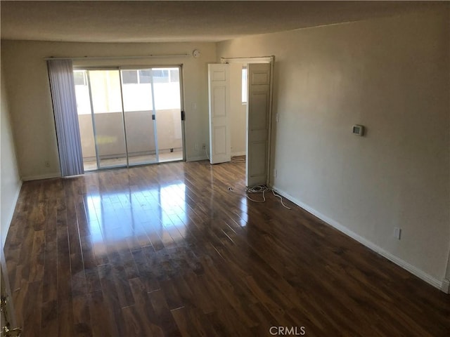 6339 Morse Ave Unit 202, North Hollywood, CA 91606 - empty room with dark wood finished floors and baseboards