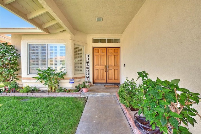 10707 Champagne Rd, Alta Loma, CA 91737 - view of exterior entry with stucco siding