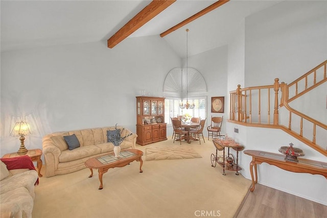 10707 Champagne Rd, Alta Loma, CA 91737 - living room with beamed ceiling, high vaulted ceiling, stairs, a chandelier, and carpet floors