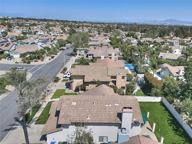 10707 Champagne Rd, Alta Loma, CA 91737 - aerial overview of property's location with nearby suburban area and a mountainous background
