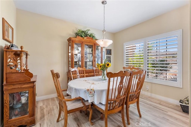 58598 Santa Maria Dr, Yucca Valley, CA 92284 - dining room with light wood-style floors and baseboards