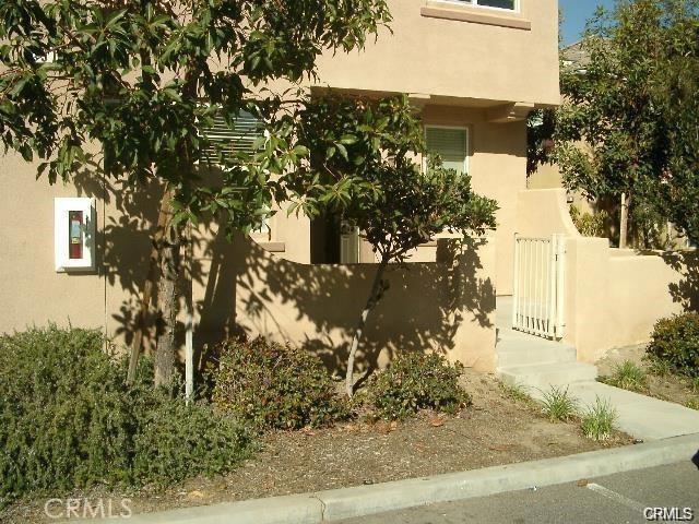 28266 Socorro St Unit 92, Murrieta, CA 92563 - view of side of home featuring stucco siding