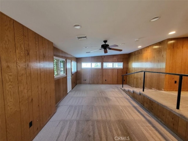 532 N Reese Pl, Burbank, CA 91506 - spare room featuring wooden walls, light carpet, ceiling fan, and recessed lighting