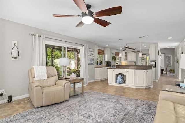 1990 Willowbrook Dr, Oceanside, CA 92056 - living room featuring ceiling fan, baseboards, and recessed lighting