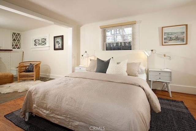 2057 Oakwood St, Pasadena, CA 91104 - bedroom featuring wood finished floors and baseboards