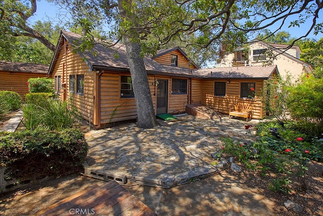 2057 Oakwood St, Pasadena, CA 91104 - rear view of property with faux log siding and roof with shingles