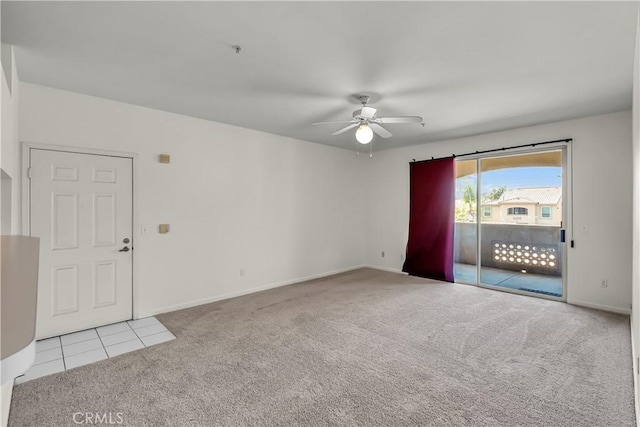 375 Central Ave Unit 173, Riverside, CA 92507 - carpeted empty room with a ceiling fan, baseboards, and tile patterned floors