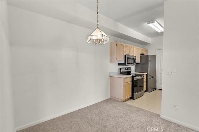 375 Central Ave Unit 173, Riverside, CA 92507 - kitchen featuring appliances with stainless steel finishes, light brown cabinets, light colored carpet, baseboards, and light countertops