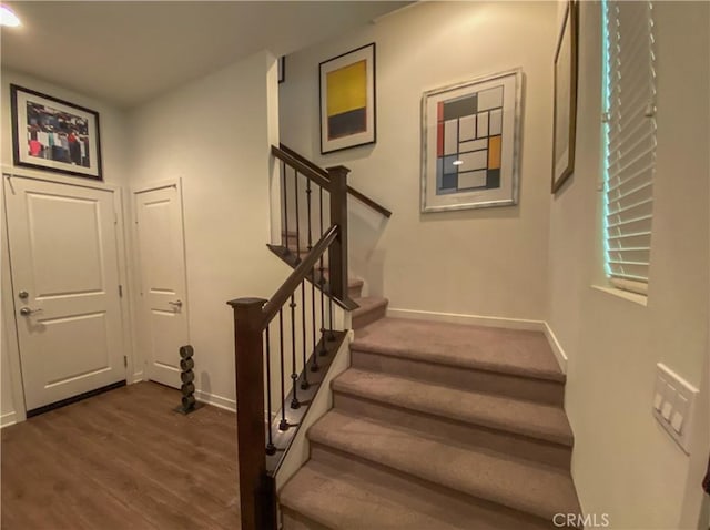 5 Abarrota St, Rancho Mission Viejo, CA 92694 - staircase with baseboards and wood finished floors