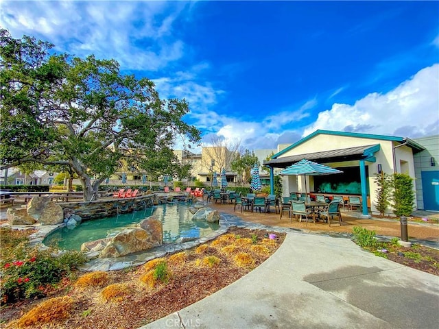 5 Abarrota St, Rancho Mission Viejo, CA 92694 - surrounding community featuring outdoor dining area, a patio, and a swimming pool
