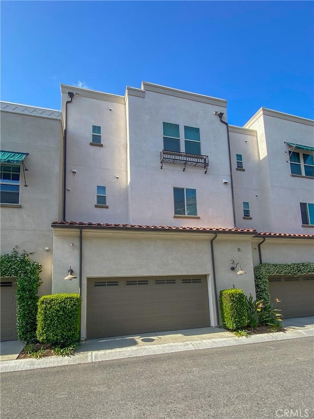 5 Abarrota St, Rancho Mission Viejo, CA 92694 - view of front of house featuring an attached garage and stucco siding
