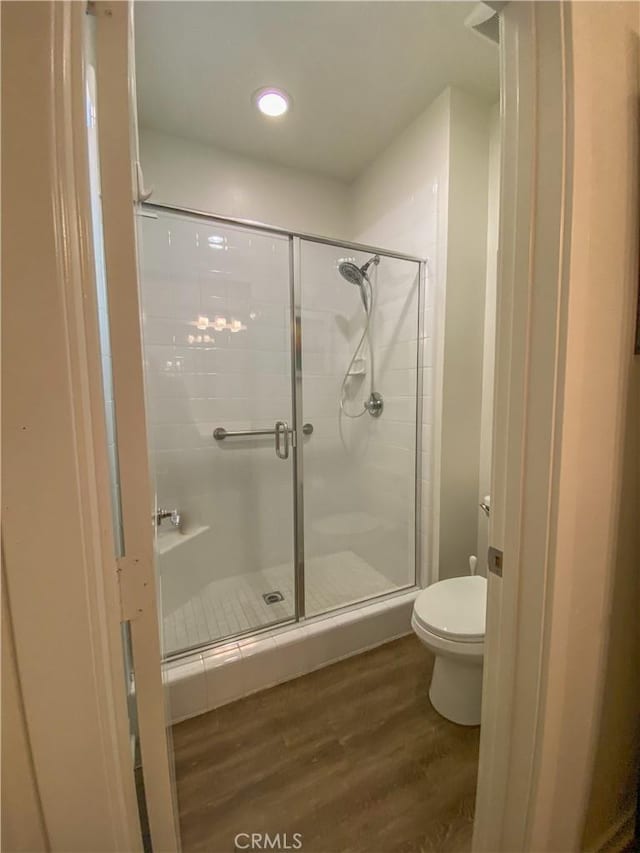 5 Abarrota St, Rancho Mission Viejo, CA 92694 - full bath featuring toilet, a shower stall, and wood finished floors