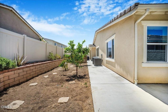 30106 Stargazer Way, Menifee, CA 92584 - fenced backyard with a patio and central AC unit